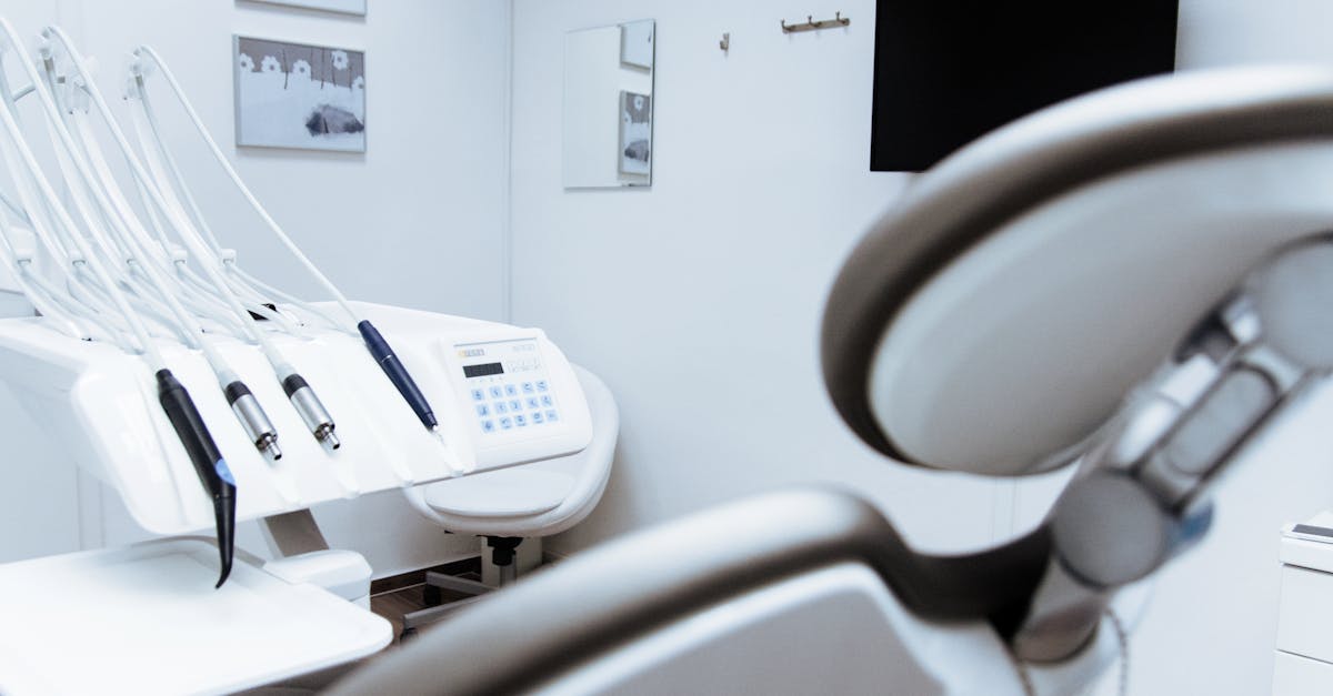Bright dental office showcasing modern equipment and clean, sleek design.